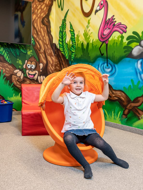 Child plays in the playroom in the family hotel Zehnerkar & Obertauern